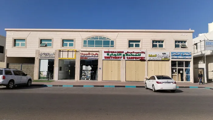 A shop for rent with an area of four meters by fourteen meters. There is a bathroom in the middle of the Hili Ndod Jaham industrial market, a vital area suitable for any commercial activity : Image 1