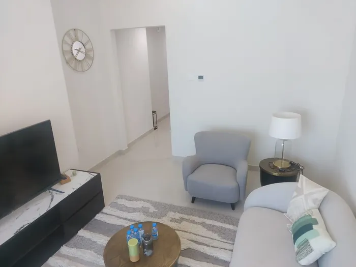 With installments over 90 months and only a down payment of 63,000 dirhams, receive your apartment two rooms and a hall immediately and invest in Ajman : Image 1