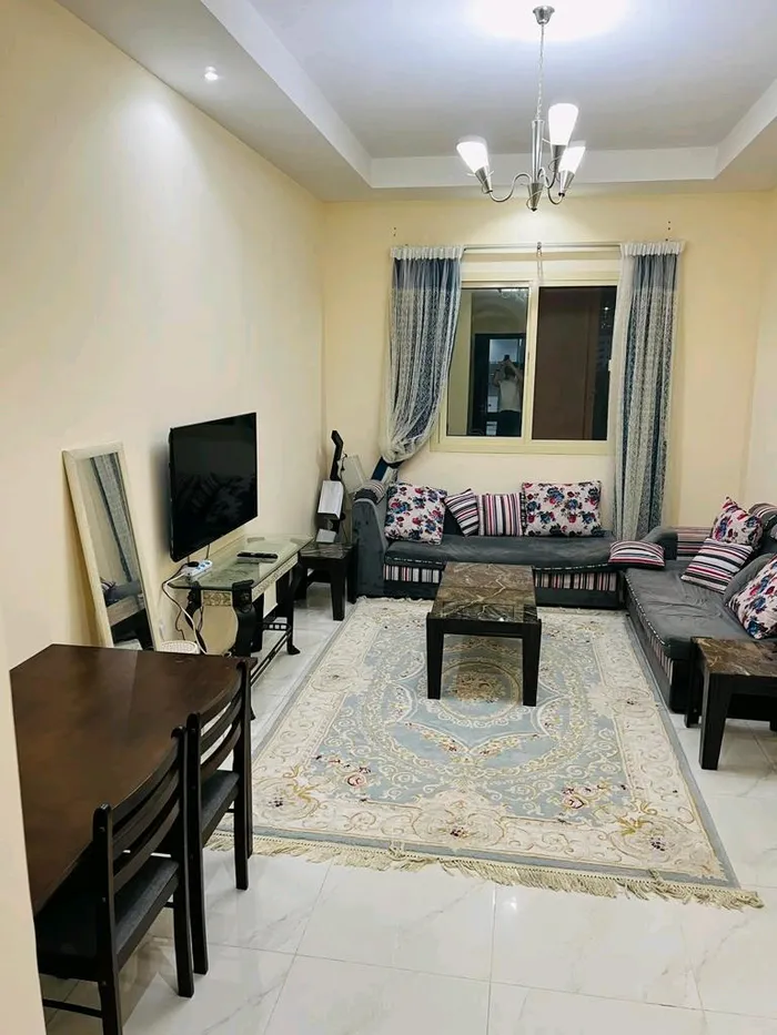 A room, a hall and a balcony with a city view. Very clean furniture 
Including all bills 
Smart screen, new furniture and fast Internet 
3500 dirhams
Ajman Corniche : Image 1