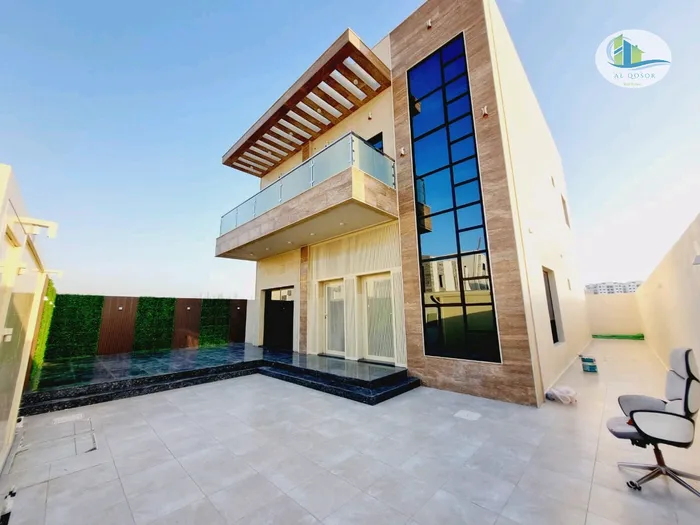 Including registration and ownership fees in Ajman, Al Amira area, two floors facing a stone directly on a neighbor street, with the possibility of bank financing : Image 1