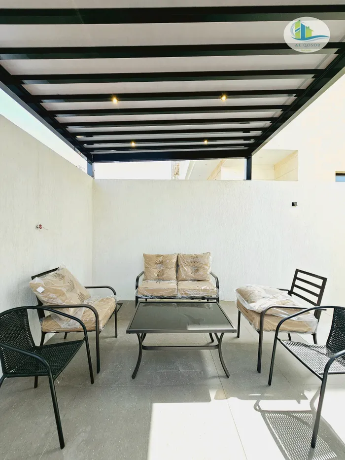 Villa for sale in Ajman, Al Yasmeen area, with two floors and a stone roof directly on a running street, with the possibility of bank financing : Image 1