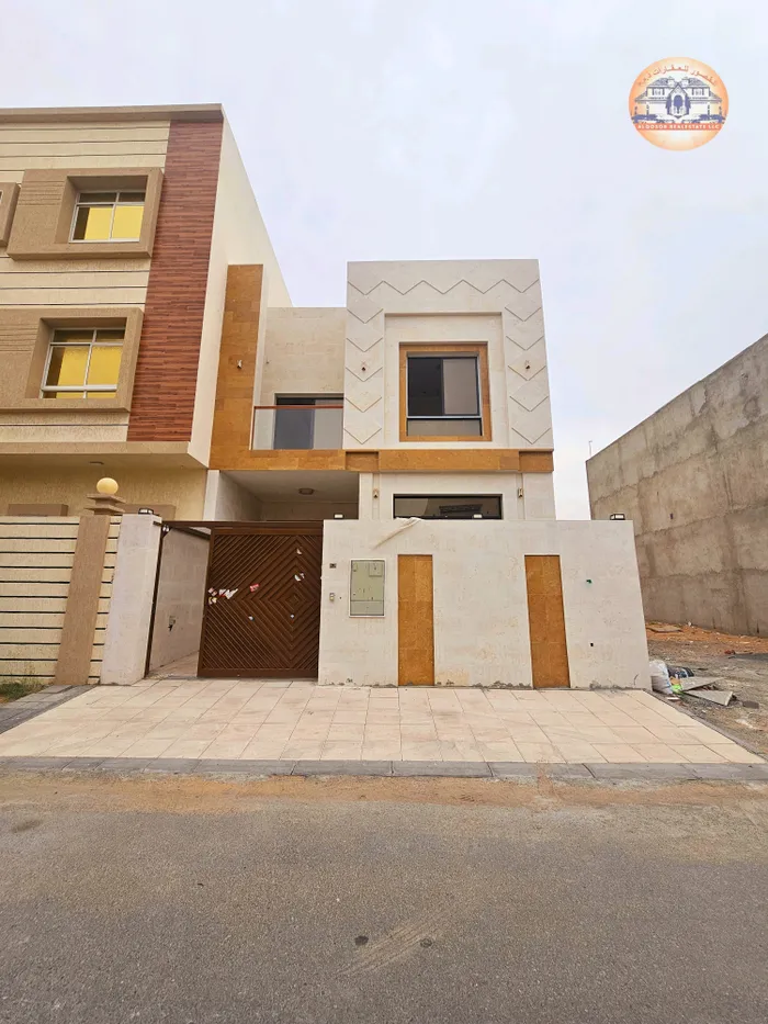 Villa for sale in Ajman, Jasmine area, with two floors and a stone roof directly on a neighbor street, with the possibility of easy bank financing : Image 1