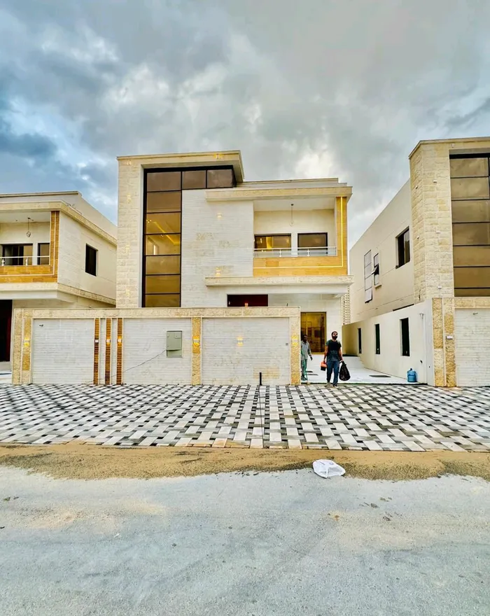 شامل رسوم التسجيل والتملك بعجمان فيلا للبيع منطقة العامره طابقين وجهه حجر على شارع جار مباشرة : Image 1