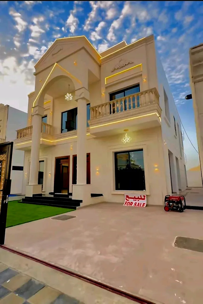 With a swimming pool, a villa for sale in Ajman, Al Amira area, two floors facing a stone directly on a neighbor street, with the possibility of easy bank financing : Image 1