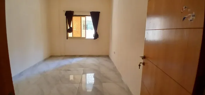For annual rent, a room and a hall, Kuwait Street - Al Nuaimiya 2 - Ajman, at a special price : Image 1