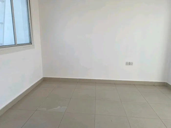 An extension for rent consists of 3 master rooms, a hall, a kitchen, a private entrance and a garage including electricity, water and maintenance. The price is 75 thousand : Image 1