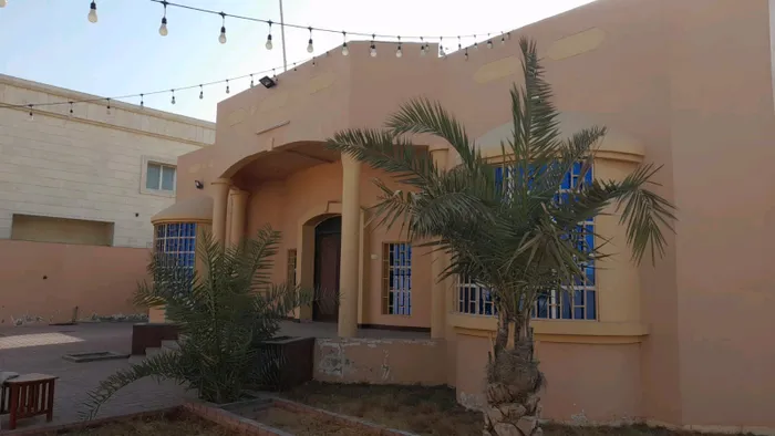 A house for rent in Ajman, Al Raqayib area, consists of 3 rooms, a majlis, a maid room and monsters. 65 thousand 4 payments are required : Image 1