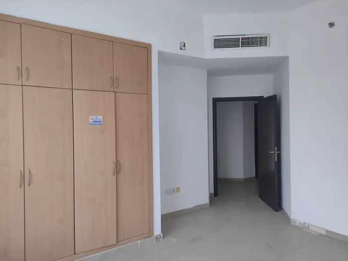 three rooms and a hall available for annual rent at unbelievable price in Ajman Corniche : Image 1