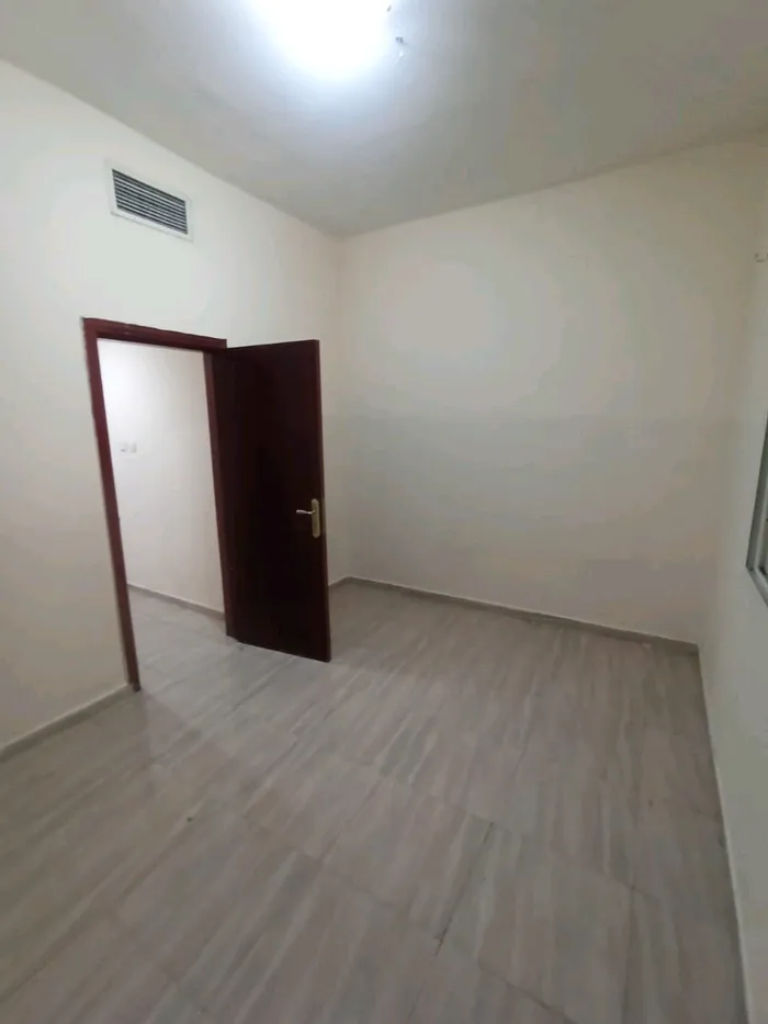 شقه غرفه وصاله للايجار الشهري غير المفروش بالبستان : Image 1