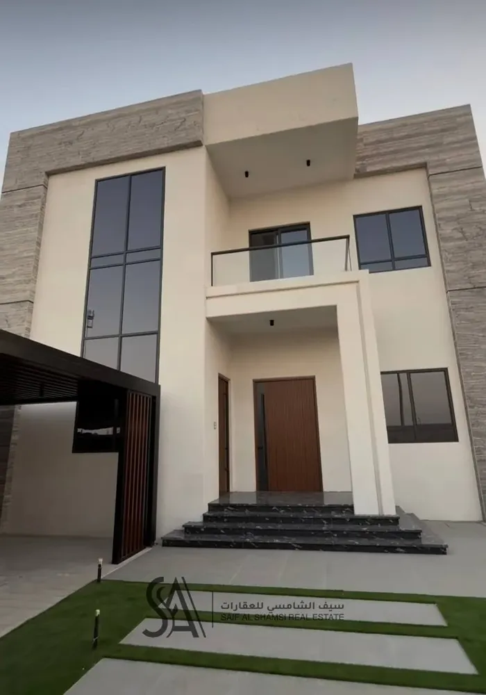 For sale a villa in the Emirate of Sharjah, Al-Hoshi area, with a modern design, completely stone, consisting of 4 master bedrooms, two halls, a kitchen ready with all the electrical appliances, a maid's room and a laundry room : Image 1