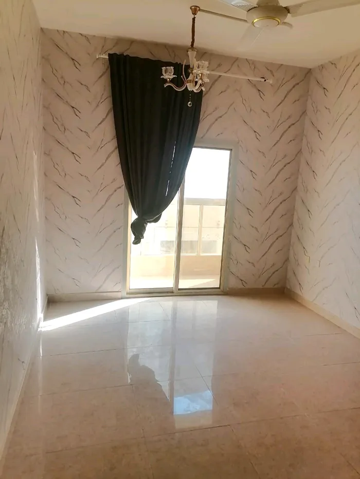 For annual rent, a two-bedroom apartment with a hall in Rawda 3 : Image 1