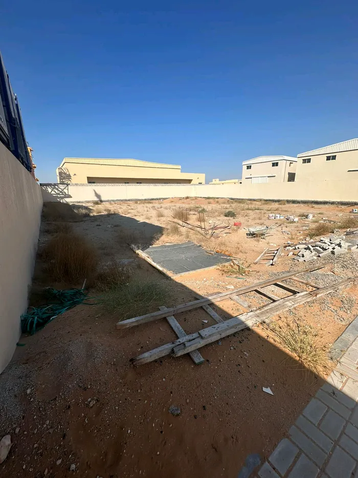 For annual rent, a fenced land (a plot of land) with an area of ​​15,000 square feet in Umm Al Quwain : Image 1