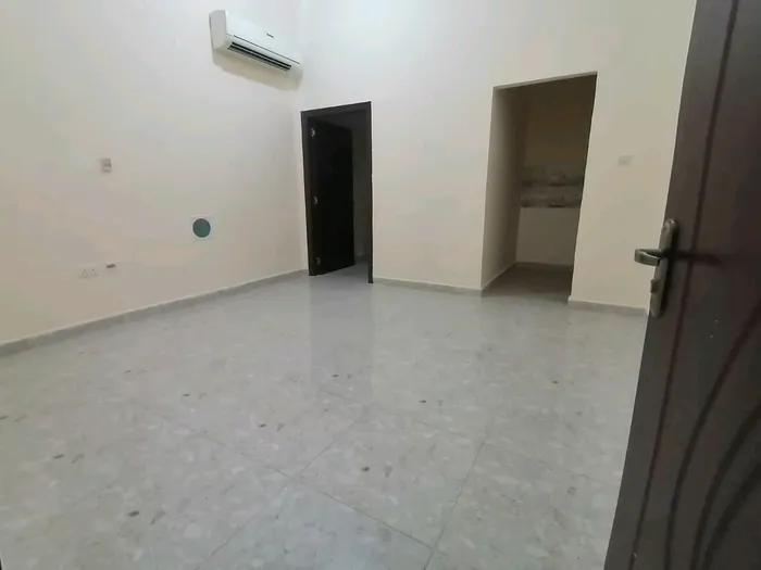 For annual rent, a one-bedroom apartment and a living room in Mohammed bin Zayed City, with a reasonable area : Image 1