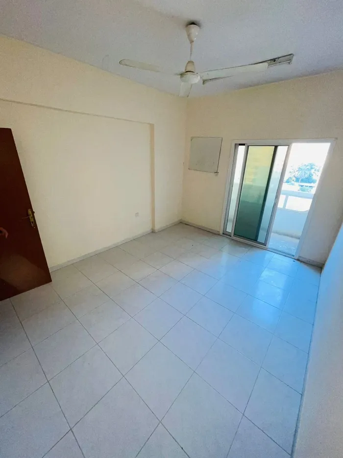 A spacious room, hall and 2 bathrooms for annual rent in Corniche Ajman : Image 1