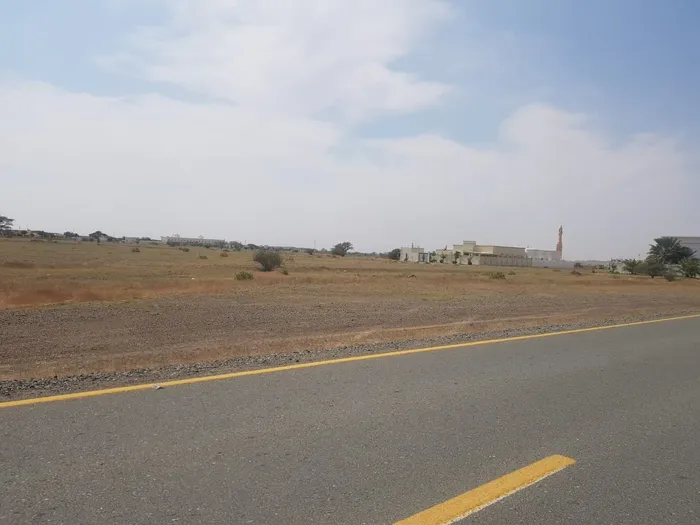 Two adjacent residential lands, one of which is a corner in Manama, basin 5 : Image 1