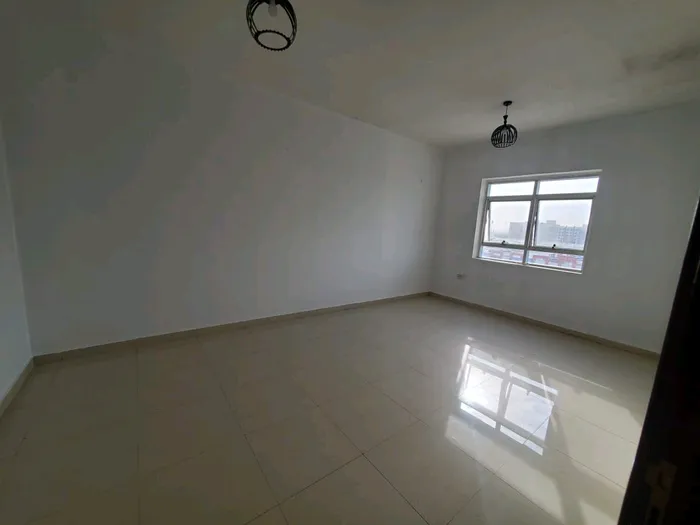 The most beautiful finishes and the largest areas at the lowest annual prices in Ajman. A room and a hall with 2 bathrooms are a very excellent opportunity : Image 1