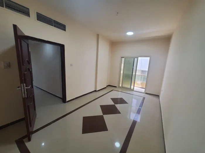 Two rooms and a hall in Ajman Corniche, a large area with two bathrooms and a balcony at an excellent price : Image 1