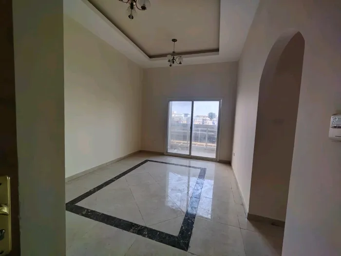 For rent a two-room apartment with an annual hall, 2 bathrooms, in Ajman, Al-Hamidiya, easy exit to Dubai and close to all services : Image 1
