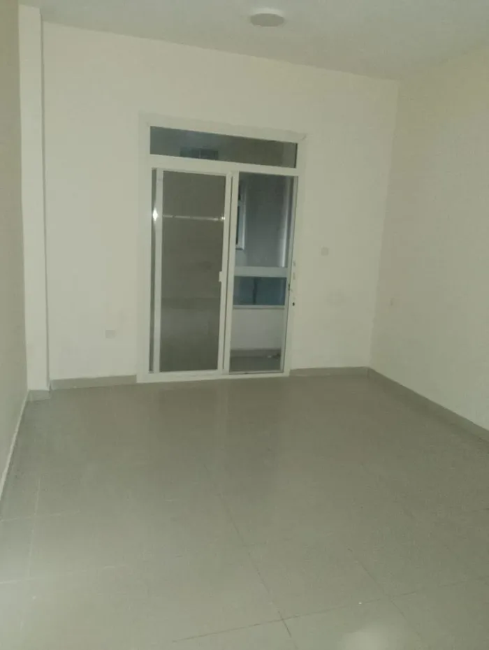 A room and a hall for annual rent in Al Nuaimah 1, close to Wasel Street, Emirates markets. All services : Image 1