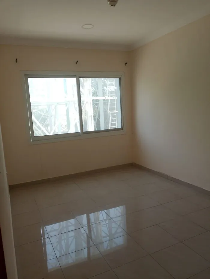 A spacious one-bedroom apartment with two bathrooms. The address is Al Nakheel close to the Corniche and close to Dubai and Sharjah exit/A spacious one-bedroom apartment with two bathrooms, located in Al Nakheel, close to the Corniche and the Dubai a : Image 1