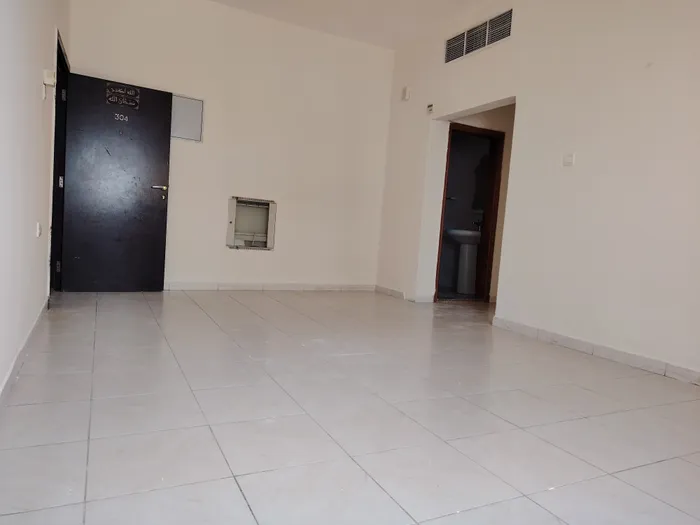 A spacious one-bedroom apartment with a bathroom. The address is Al Nuaimah, close to Thumbay Hospital and close to Dubai and Sharjah exit/Spacious one-bedroom apartment, one living room, one bathroom, located in Al Naeema, near Thumbay Hospital and  : Image 1