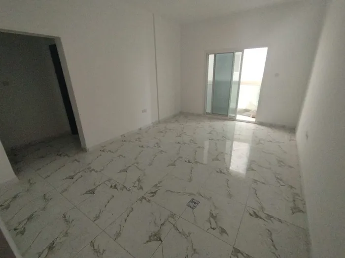 اجمل شقق عجمان باقل الاسعار غرفة وصالة تشطيبات جديدة بالكامل في الراشدية عجمان للايجار السنوي : Image 1