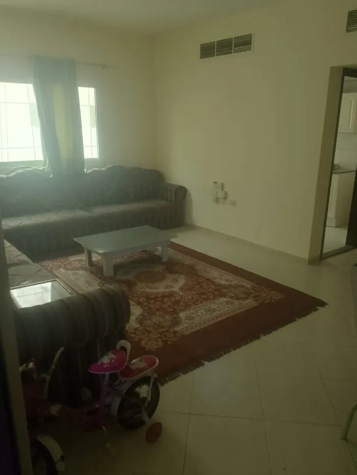 A spacious apartment with a balcony with a bathroom. The address is Al Nuaimiya close to King and Kuwait Street and close to Dubai and Sharjah exit/Apartment with one bedroom, a living room, a balcony, and a bathroom. Spacious. Address: Al Nuaimiya,  : Image 1