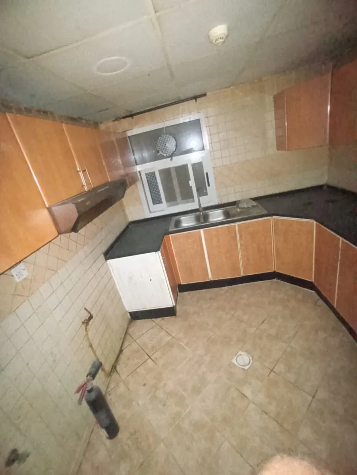Two bedroom apartment, hall, kitchen, 2 large bathrooms and balcony. The address is Rashidiya, close to Al Mina Street, Ajman, close to Mohammed bin Zayed directly to the exit of Dubai and Sharjah///Two-bedroom apartment with a living room, a kitchen : Image 1
