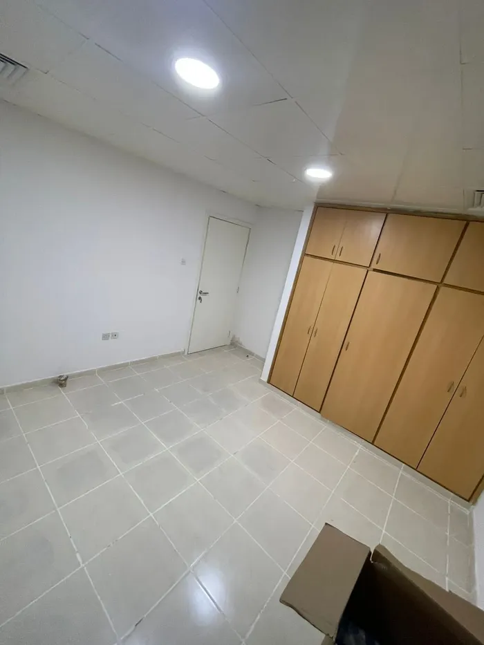 For annual rent, a spacious two-room apartment with balcony in Ajman. Address: Corniche is close to Mohammed bin Zayed, directly from the exit of Dubai and Sharjah. Two-bedroom apartment with a balcony, spacious area in Ajman. Address: Corniche, clos : Image 1