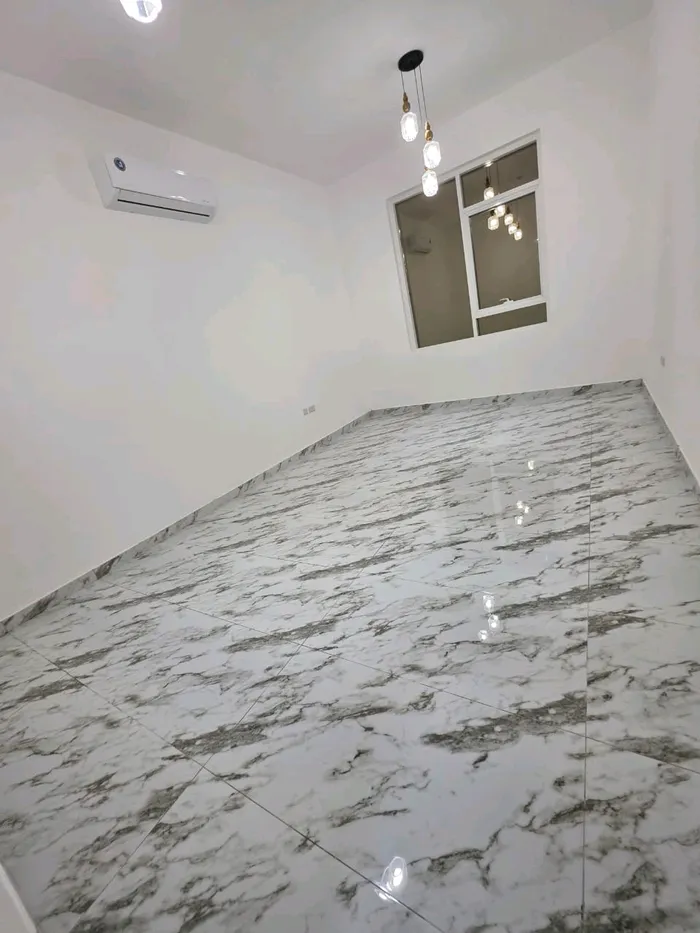 The first resident of Al Shamkha 17 is near Al Fakhama restaurant. The first resident is an apartment consisting of two rooms, a hall, a kitchen and two bathrooms, including a master room. Monthly and annual rent. Contact 0581480351 : Image 1