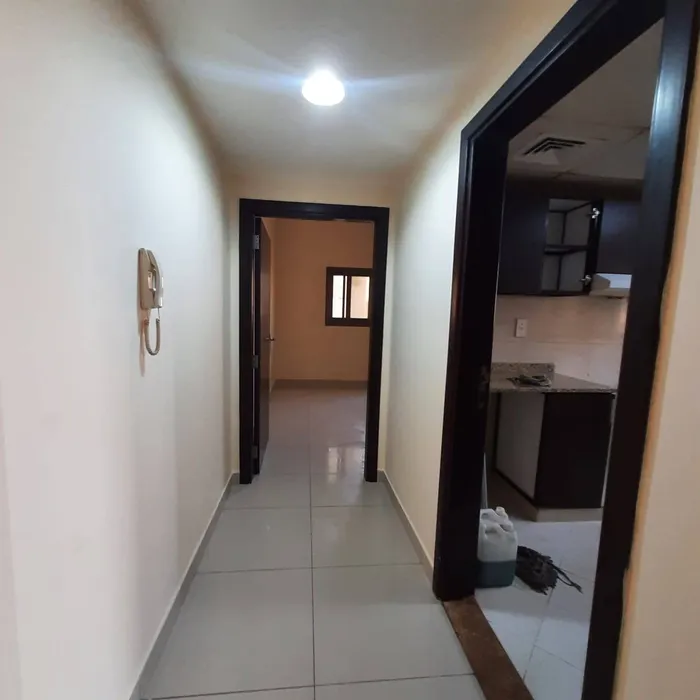 For annual rent, a room and a hall with a balcony, 2 bathrooms in Al-Rawda, 1, Ajman, a room and a hall with a balcony, 2 bathrooms///For annual rent in Al Rawda 1, Ajman one bedroom, a living room, a balcony, and 2 bathrooms : Image 1