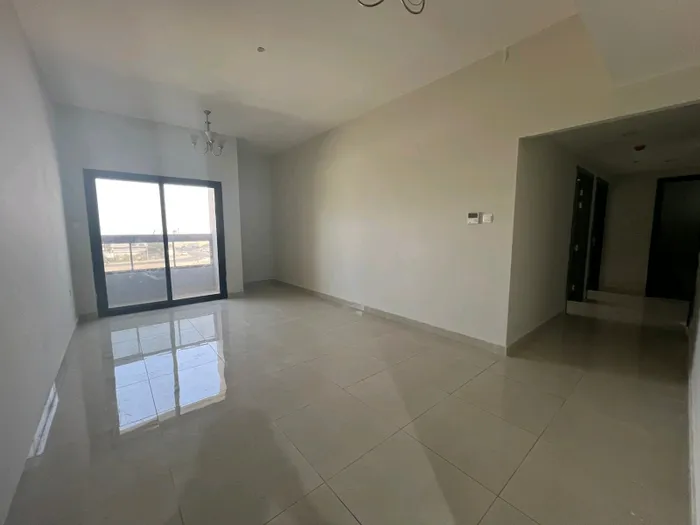 For rent, a two-bedroom apartment with a hall and two bathrooms in Ajman, Al Jurf 3, second floor, close to Mohammed bin Zayed Street : Image 1