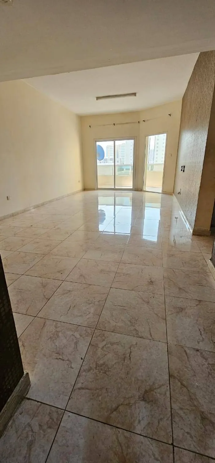 Two rooms and a hall with a balcony, 2 bathrooms, Al Jerf 3, opposite the university : Image 1