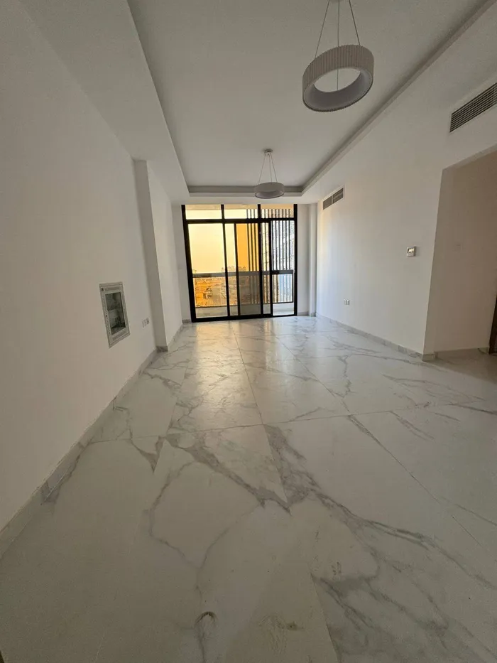 Two rooms and a hall with a balcony. 2 bathrooms. Al Jerf 3. The first resident is next to the Chinese market : Image 1