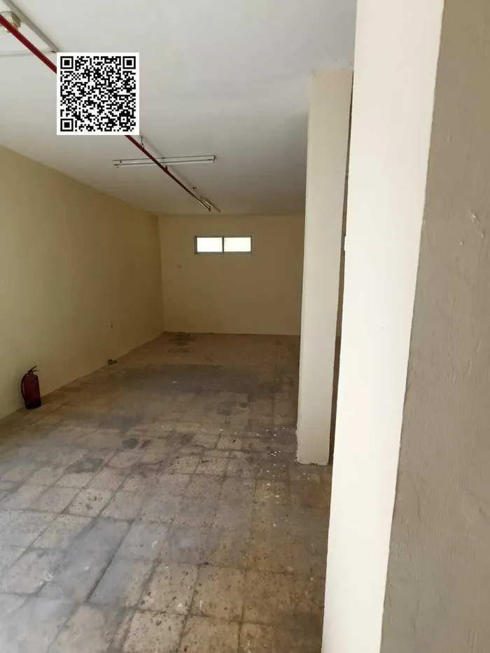 A commercial warehouse for annual rent in Al Jurf Industrial Area 1 with an area of 2300 feet and a price of 85 thousand per year and suitable for all commercial activities : Image 1