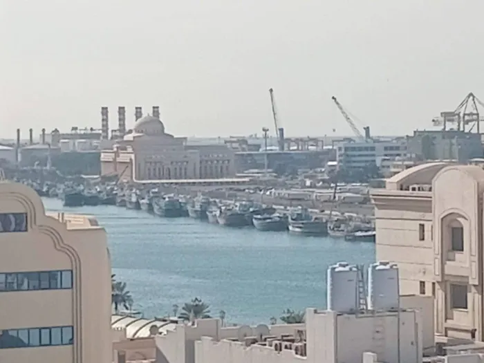 🏢 Open sea view studio with balcony and separate kitchen for annual rent in Al Mujarrah _ Sharjah 🏡 : Image 1