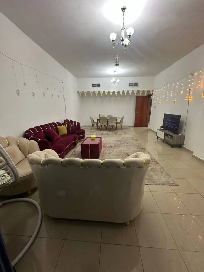 Two rooms and a furnished hall for monthly rent in Ajman, Al Diwan Towers, a vital and distinctive location : Image 1