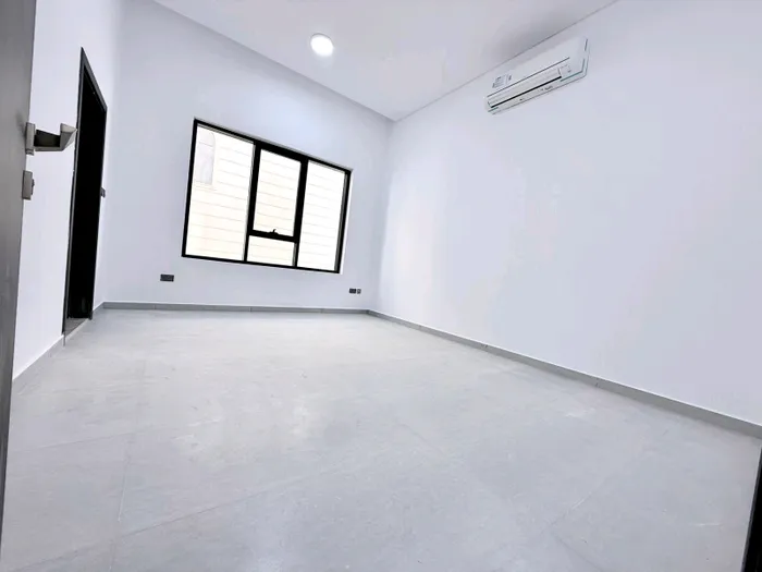 A three-bedroom apartment with a maid's room and a ground floor board in Riyadh : Image 1