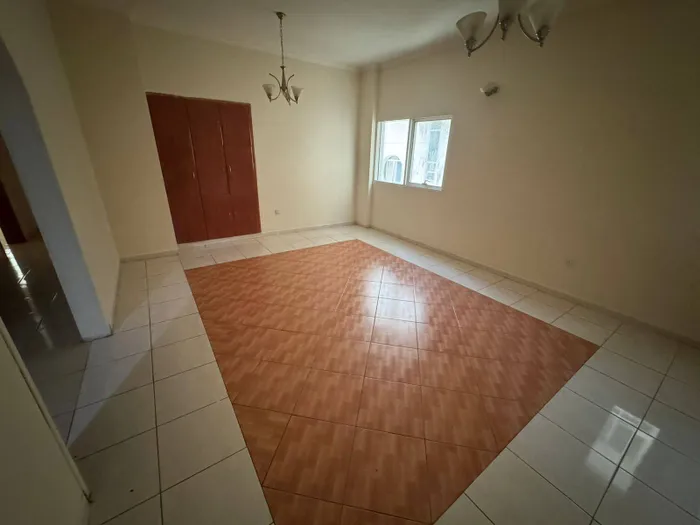 Two bedroom apartment for annual rent with air conditioning and free parking in Al Qasimia : Image 1