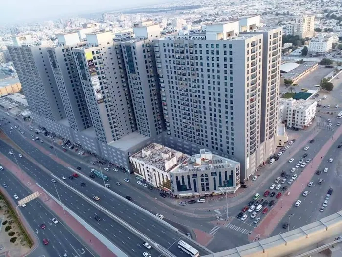 🏡 2-Bedroom Apartment for Sale – City Towers Ajman  ✨ A great opportunity for living or investment with existing rental income  📐 Size: 1,200 sq ft 🛏️ 2 Bedrooms 🚿 2 Bathrooms 🍽️ Enclosed Living Room 🌆 Stunning open views of:  • Royal Palace • Grand  : Image 1